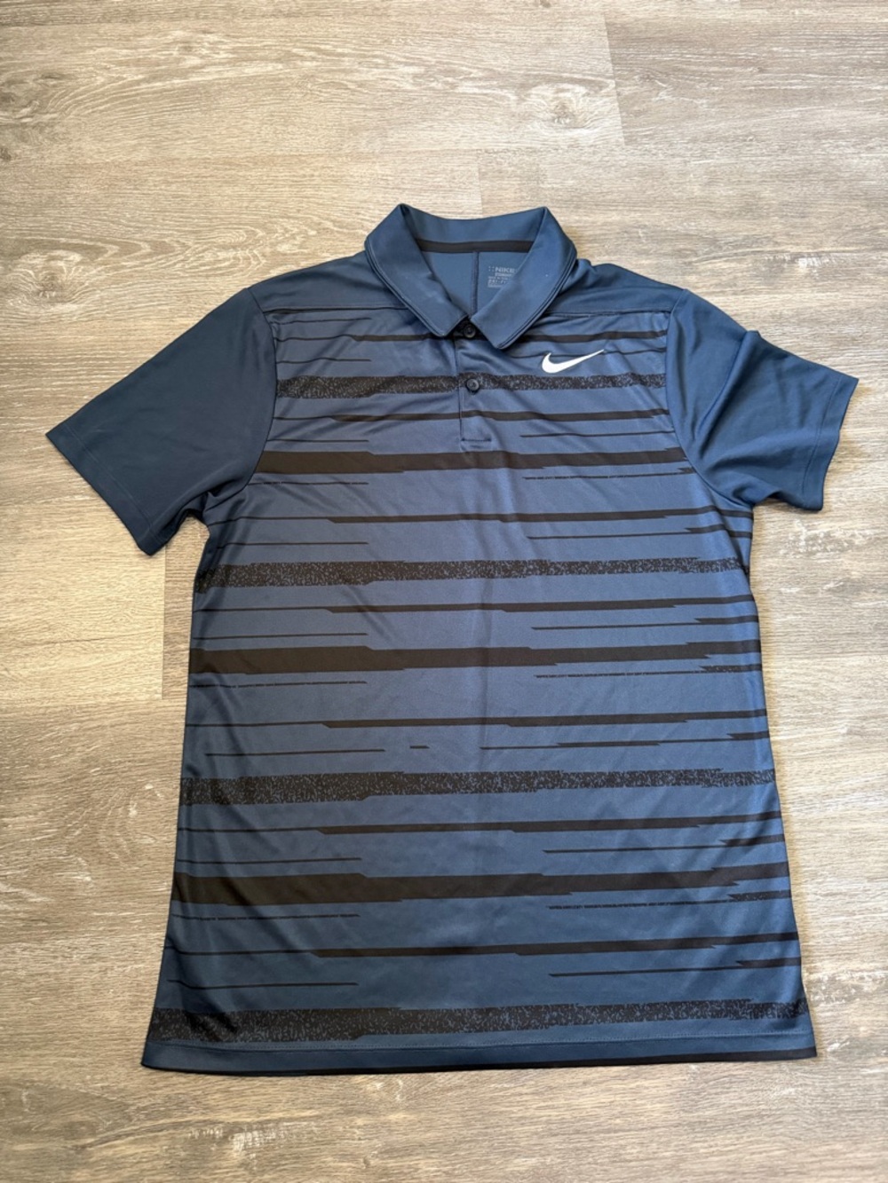 Nike Men's Dark Blue Polo with Black Stripe Pattern